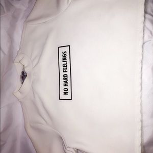 “No Hard Feelings” crop top.